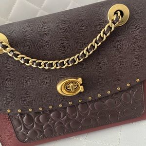 Burgandy classic Coach purse.